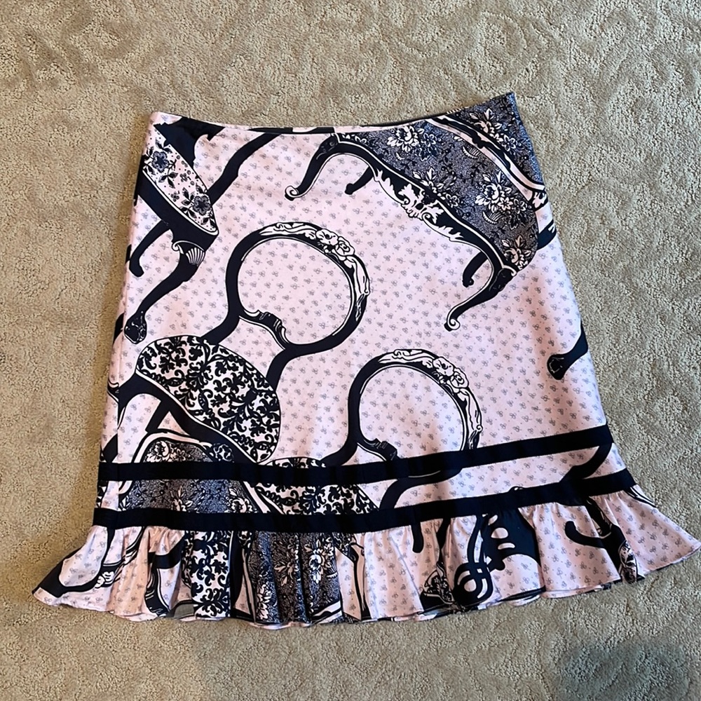 Beautiful pink skirt with black design and detail